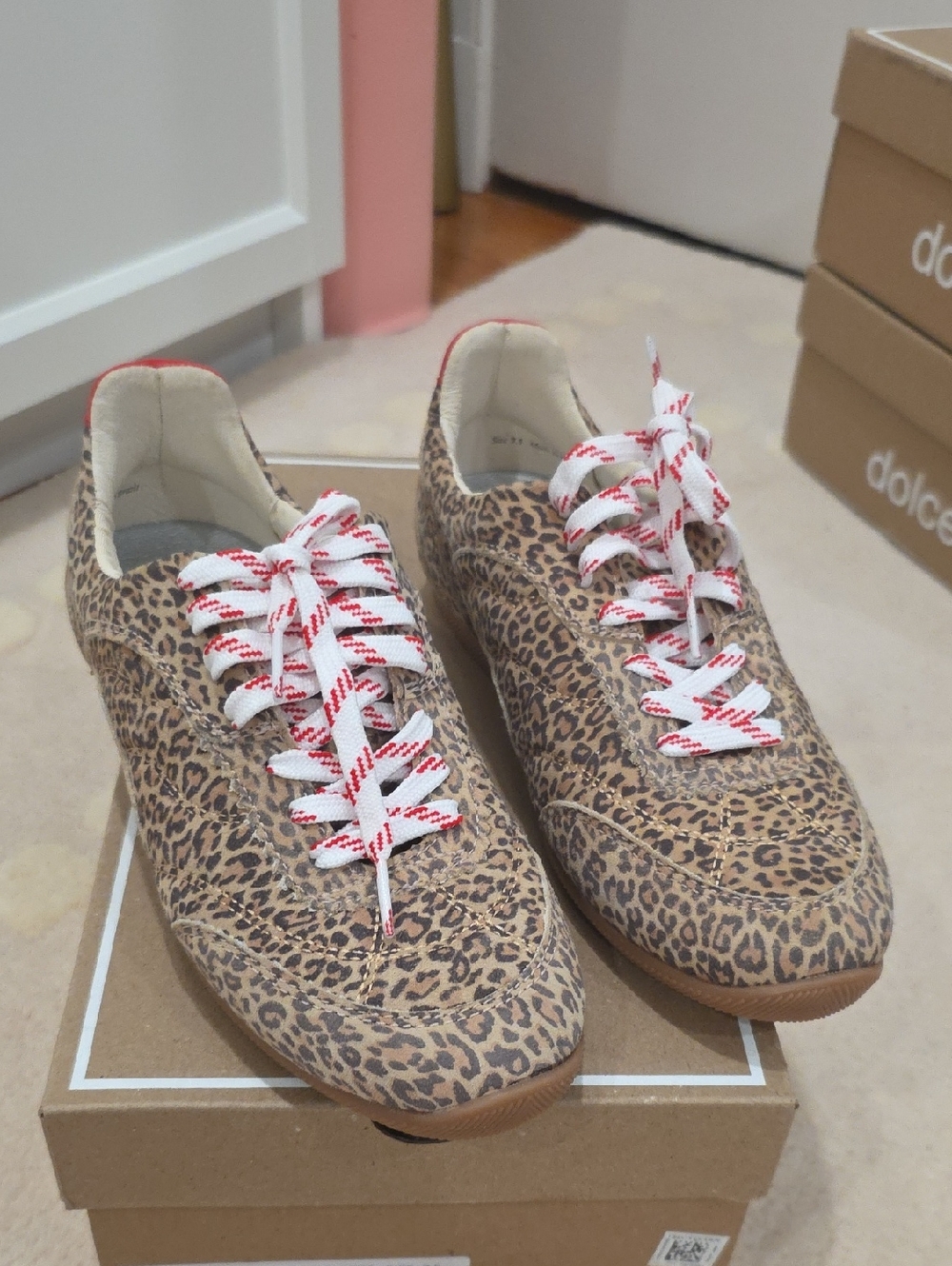 Leopard Print Women’s Sneaker with Red-Trim Laces. Size 7.5